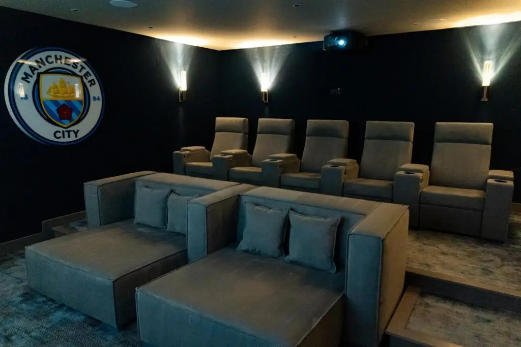 Kaleidescape home cinema system with projector and surround sound